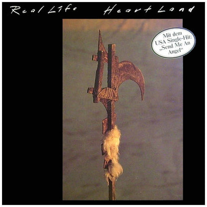 REAL LIFE - HEART LAND | VINILO USADO