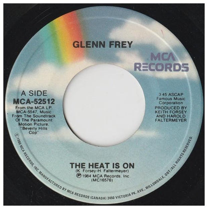 GLEN FREY - THE HEAT IS ON | 7" SINGLE VINILO USADO
